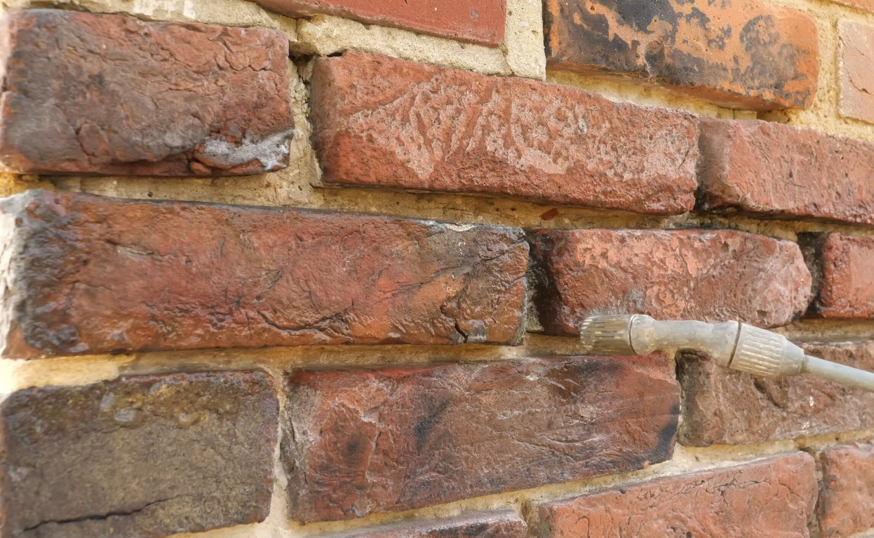 Tuckpointing and repointing masonry services to restore mortar joints in Ann Arbor